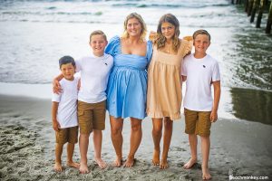 A family photo shoot in Garden City, SC Pier on July 14th, 2022 with Kally's family by Beachmonkey of beachmonkey photography, a family photographer